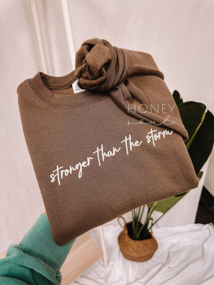 Embroidered Stronger Than The Storm Sweatshirt